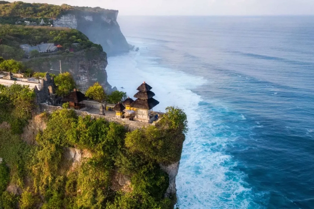 Pura Luhur Uluwatu temple on a cliff above the Indian Ocean in Pecatu, Bali